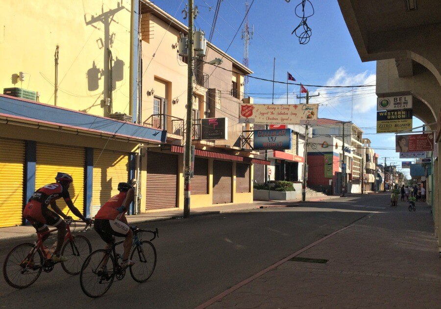Cyclists through Belize City