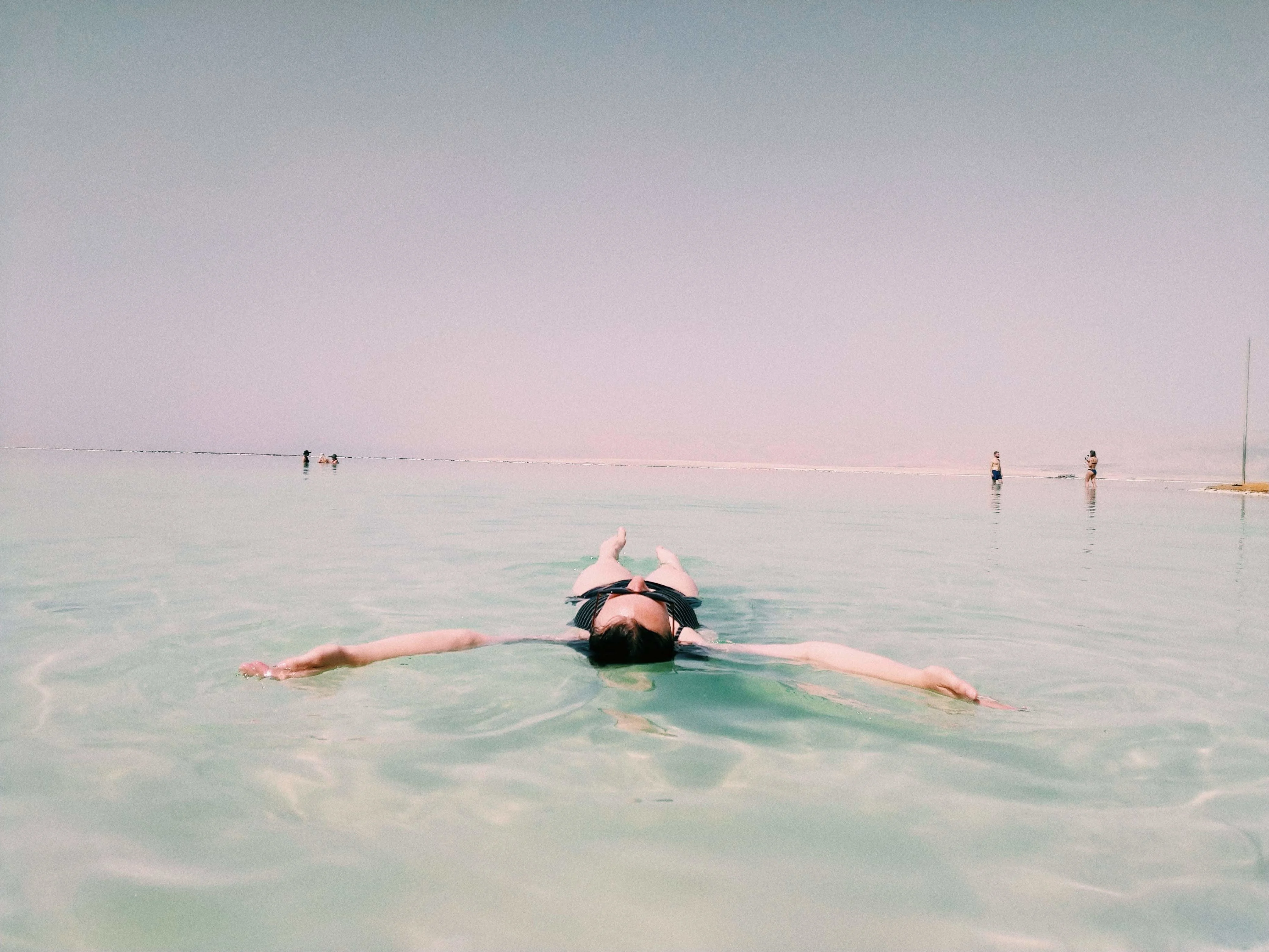 A person floating in the dead sea
