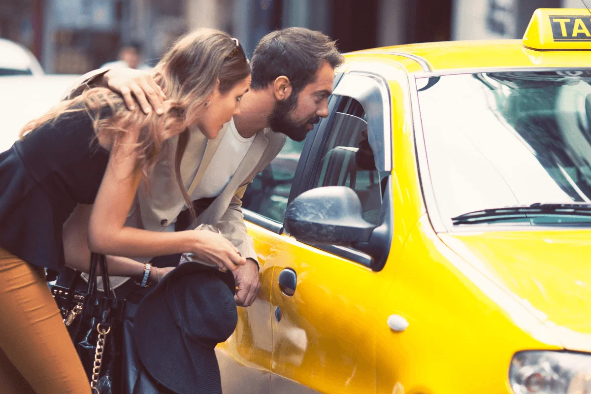 couple getting a taxi in new york