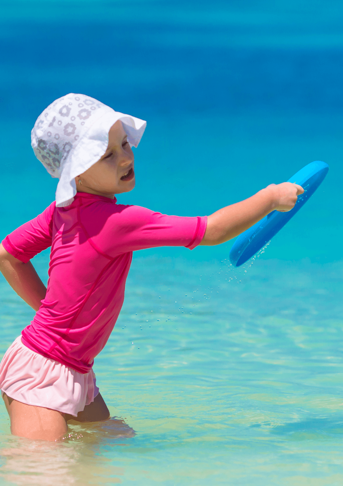 Pack a frisbee for the family to play on the beach
